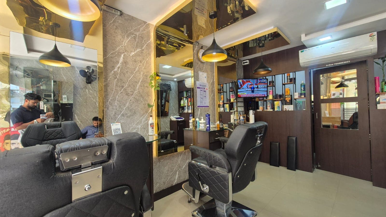 A ONE Hair Beauty Parlour interior and styling stations
