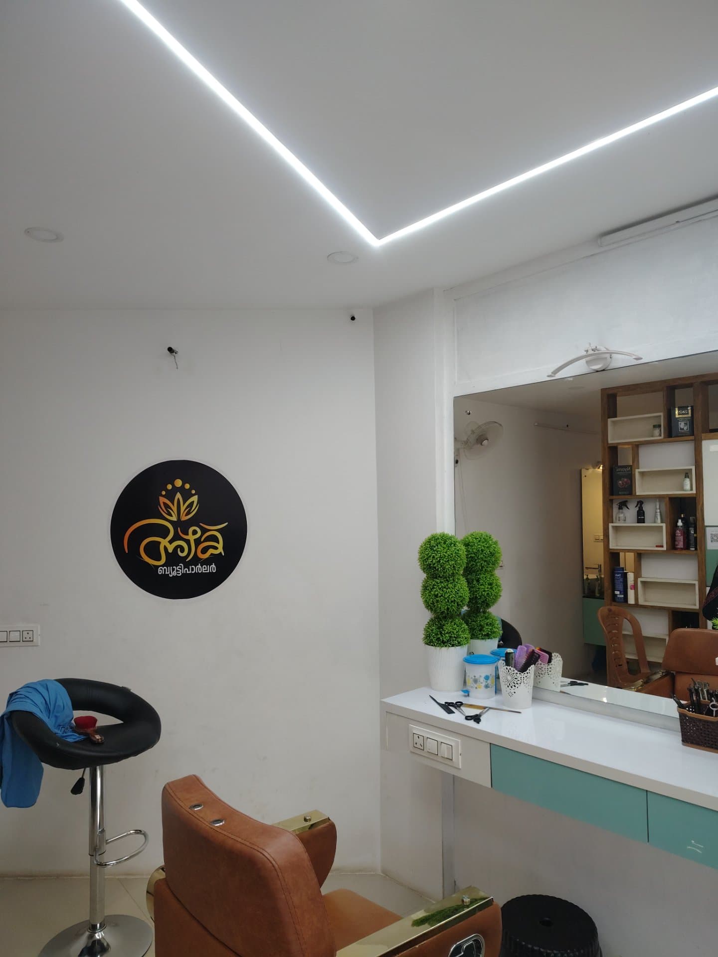 Azhak Beauty Parlour interior and styling stations